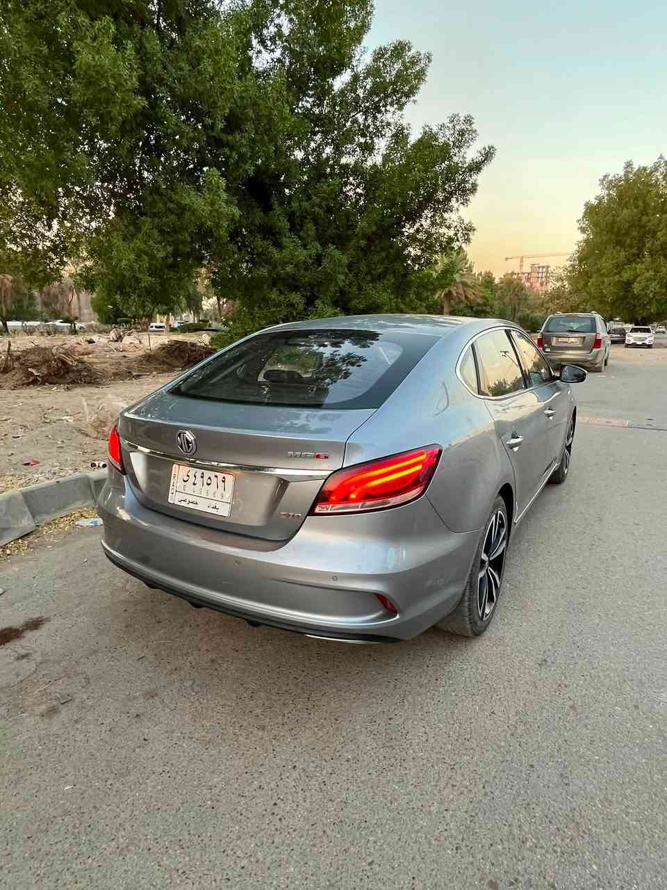 🚘 MG6 Trophy 2022 للبيع

* 🔥 محرك 1.5 تيربو
* ⚙️ كير أوتوماتيك 7 سرعات DCT –
* 🏎️ فئة Trophy – فول مواصفات
* 📍 ماشيه 32,000 كم فقط
* 🚫 بدون صبغ بدون حادث
* 🛡️ بعدها على ضمان الشركة
* 🌙 فتحة سقف
* 💡 إضاءة LED
* 🛞 تاير 18 إنش
* 🖥️ شاشة وسطية 10.1 إنش
* 📱 أنظمة ربط الهاتف Apple CarPlay / Android Auto
* 🔑 دخول وتشغيل بصمة
* 📷 كاميرا خلفية + حساسات خلفيه 
* 🎛️ مقود متعدد الوظائف + Paddle Shifters
* 💺 مقاعد جلدية
* 🛡️ 6 وسائد هوائية
* 🔒 أنظمة ABS + ESP + Traction Control
* ⛰️ مثبت سرعة + Auto Hold
* 👌 السيارة نظيفة جداً ومحافظ عليها
📍رقم بغداد
📞 للتواصل: *********** واتساب

