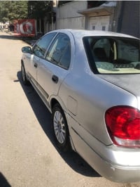 نيسان صني ياباني موديل 2006 بأسمي السعر 70$  وبيها مجال للشراي لطفاً ل...