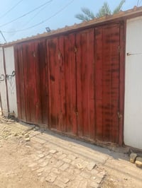 واجهة محل • ٢ باب سلايت • باب حديد