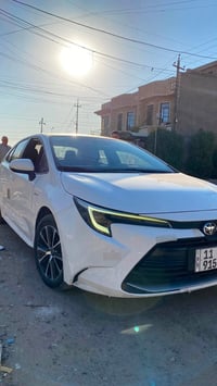 للبيع Toyota كورولا  2025 شكل امريكي هايبرد  ماشيه 36 الف  رقم بغداد ت...