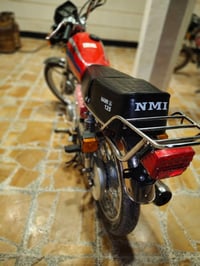 NMI 125 • موديل 26