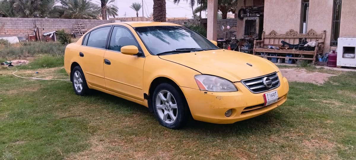 نيسان التيما • ٢٠٠٤ • بغداد التاجي