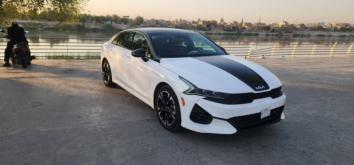 🚘 كيا K5     GT-Line 2023
السياره منفيس دخول جديد
اللون:  ابيض
الفئة: GT-Line فول مواصفات
المحرك: 1600 CC تيربو
الحادث: خلفي خفيف تبديل دعامية خلفيه 
الكشنات: احمر 

المواصفات:
بانوراما
بصمة تشغيل وتشغيل عن بعد
شحن هاتف لاسلكي
قيادة ذاتية على الخطوط السريعة
هاند بريك بصمة
مثبت سرعة
ABS ومانع انزلاق
حساس ضغط الإطارات
بك لايت LED
شاشة مع خرائط ملاحة
كاميره دوارة
رادارات جانبية ومراقبة النقطة العمياء
رادار الخطوط البيضاء
إشارات بالمرايا
لايتات 3 عدسات
أوضاع قيادة Eco / Sport / Smart / Normal
بلوتوث + USB + AUX
تحكم ستيرن كامل
كير أوتو + عادي
أوتو بريك
ستيرن LED D
زينون
توقف ذاتي عند الرجوع
صندوق بصمة

📍 المكان: بغداد الكاظمية
  ***********
***********
