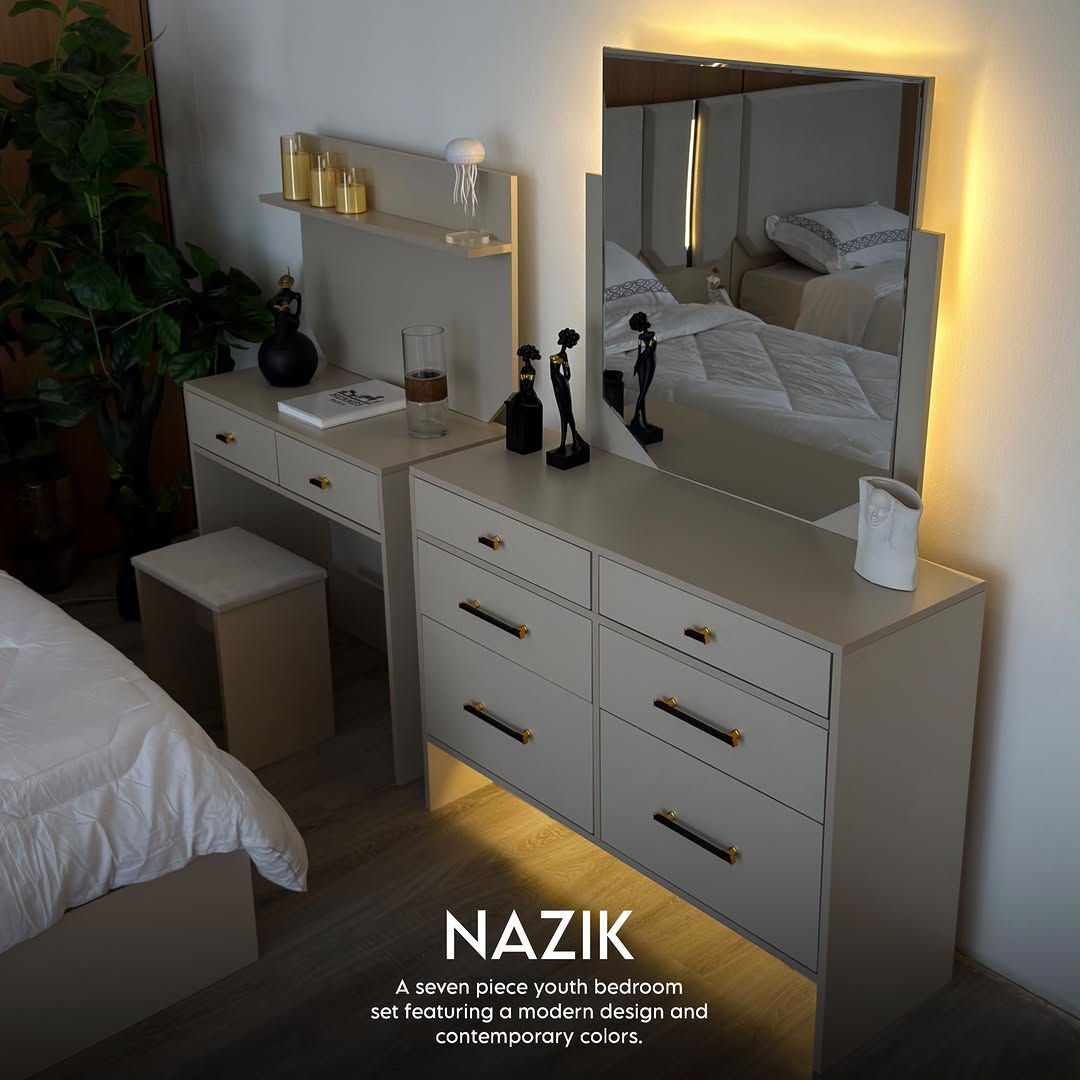 شبابي 7 قطع

نص مكتوب في الصور:
- NAZIK
- A seven piece youth bedroom
- set featuring a modern design and
- contemporary colors.
- A seven piece youth bedroom set featuring a modern design and contemporary colors.
- NAZIK A seven piece youth bedroom set featuring a modern design and contemporary colors.