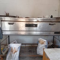 فرن حجري • ٣ مشاعل • ٣ صواني