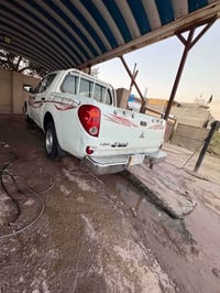 ميتسوبيشي ل٢٠٠ • ٢٠١٠ • مكفولة محرك وگير
