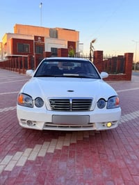 أوبتيما ٢٠٠٢ • صبغ عام • رقم بغداد