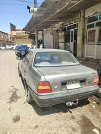 نيسان صني موديل 93 رقم بغداد صاحبها بل موصل شرط التحويل كير مكينه جديد...