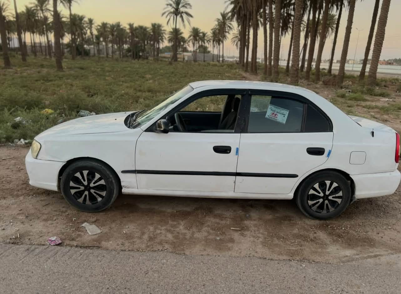اكسنت • ٢٠٠١ • كير عادي