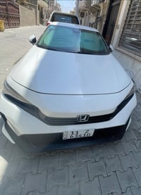 هوندا سيفك 23  رقم بغداد بأسمي  حادثها جاملغ خلفي وصبغ باب   منزلك صور...