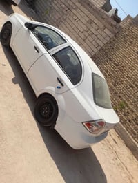 افيو ٢٠١٠ • محرك مفتوح • جير اوتوماتيك