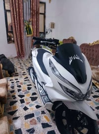 دراجة بي سي إكس جيل ثالث ماشية 17حقيقي بيه بس كلج خلفي/07712322661