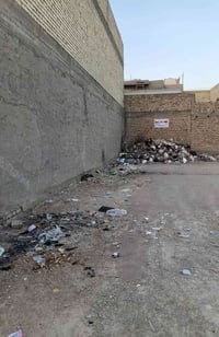 طابو صرف • أرض ١٠٠م • قرب مدرسة بغداد