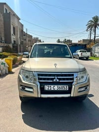 باجيرو 2018 لون ذهبي رقم سليمانية مكانه بغداد   مكفولة بدون صبغ او ضرر...