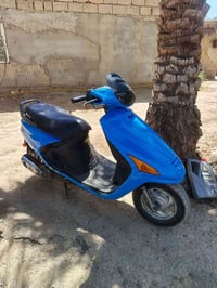 فراشة • حاوية • برغي ما مفتوح