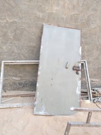 باب حديد • درج حديد