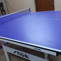 طاولة تنس Stiga • نظيفة جدا • ٤ مضارب ٢ اصلية