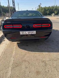 ( للبيع فقط )   جالنجر 2022 SXT محدثة SRT دعامية والدركة وتاير والويل ...