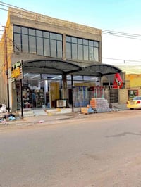 بناية طابقين • ١٢٠م • مأجر ماركت