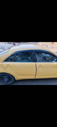 عندي كامري 2009 اريد امراوس ابيكم الرقم 07746760380