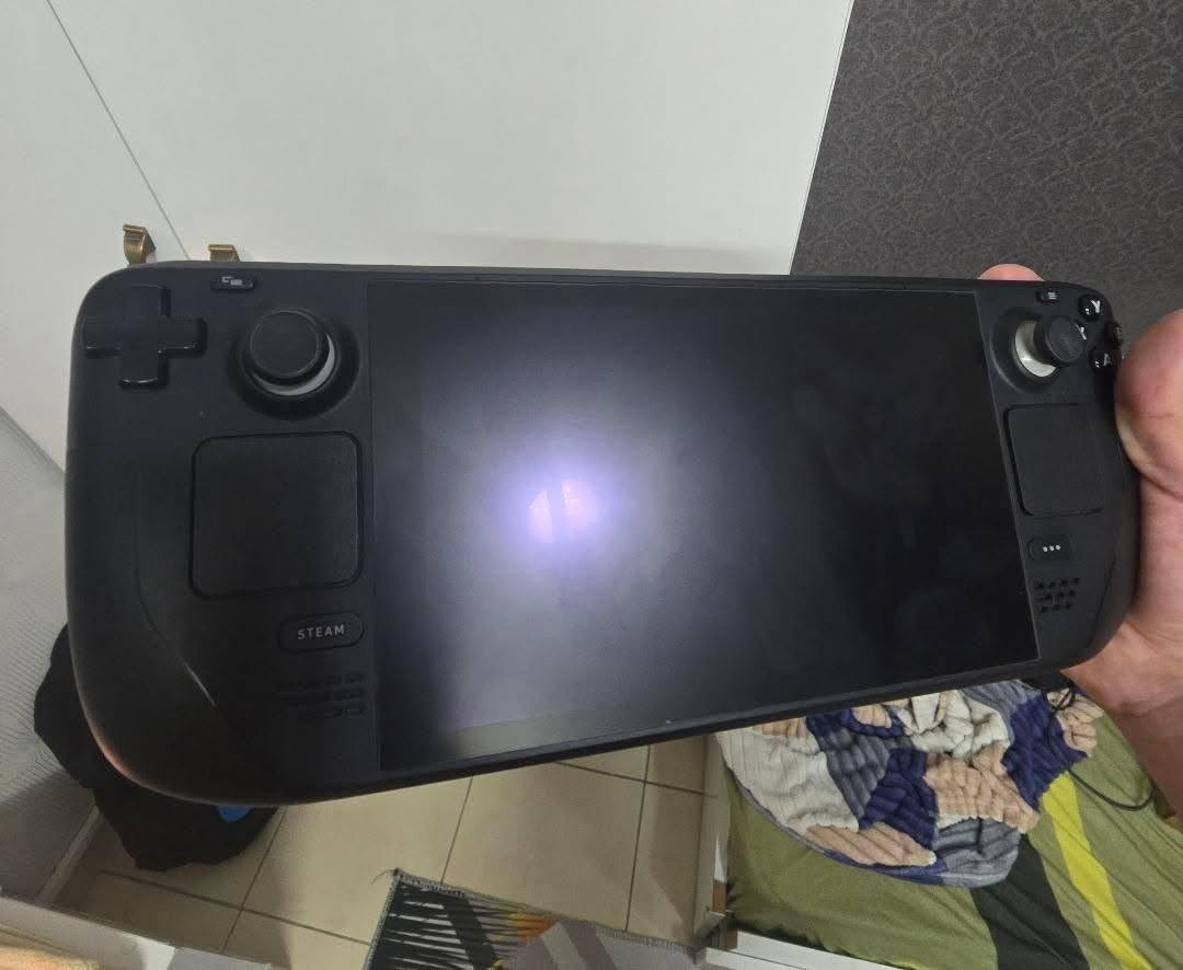Steam Deck LCD 512gb
السعر 535 الف وبي مجال
 
نظيف وبي كل الملحقات واستخدام اقل من 75 ساعة
عنواني بغداد حي اور 600
رقمي *********** واتساب 

المواصفات 
Storage: 512GB High-Speed NVMe SSD (fastest internal storage for the LCD lineup)

Screen: 7-inch Premium Anti-Glare Etched Glass Touchscreen (exclusive to this 512GB LCD tier)

Processor: AMD Zen 2 CPU / RDNA 2 GPU (plays AAA PC games smoothly)

RAM: 16GB LPDDR5 RAMExpandable

Storage: Built-in MicroSD card slotOperating

System: SteamOS (user-friendly console interface + full Desktop Mode)Battery Life: 40Whr battery (2 to 8 hours of playtime depending on the game)Connectivity:

 Wi-Fi 5, Bluetooth 5.0, and USB-C port for charging/docking
