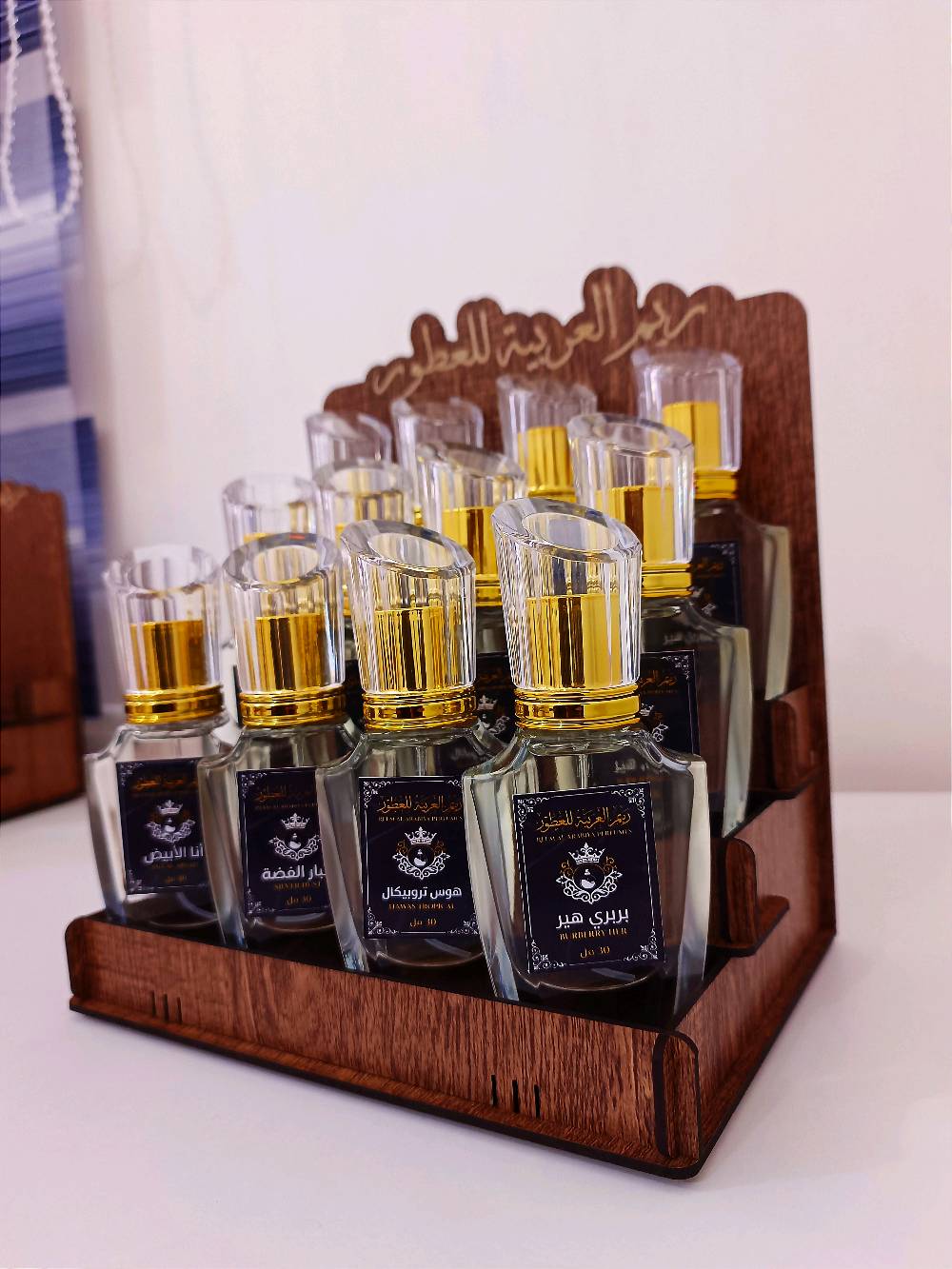 عطور مركزه • ٤ نكهات • ستاند مجاني