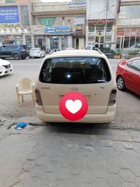 كيا كارينز • ٢٠٠٦ • رقم نجف