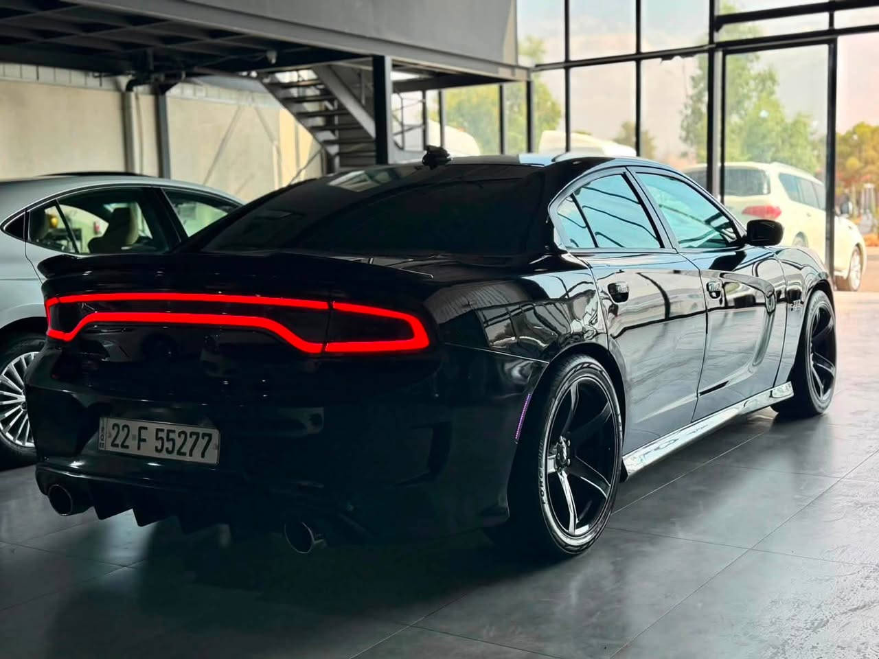 ﷽
‎‏                    DODGE CHARGE 2017 R/T
◽️دوج جارجر موديل 2017 R/T
فول مواصفات ماعدا فتحة
🔹لون ( اسود قتران ) 
~~~~~~~~~~~~~~~~~~~~~~~~~
◽️مكان🌆:سليماني                    سعر💵: 173$🔐
تليفون☎️: ***********
                 *********** واتساب
~~~~~~~~~~~~~~~~~~~~~~~~~
◽️محرك V8 5.7L تمانية سلندر🔥🚀
🔹گير و محرك بشرط
🔹بدون صوت بدون صرف بدون خلل بشرط فحص
🔹ماشية 67 الف حقيقي

◽️سيارة كامل محدث هيلكات🔥  
🔹 بيها برمجات شاشه و گيج و صوت صالنصا 🔥🔥
🔹محدث بنيت و دعاميات ويل و لحيات و دوسات سبايدر دفيوزر كل محدث هيلكات 🔥

▫️سيارة داخل بلعرق كلين تايتل
🔹 صار بلعراق ( جملغ خلفي عكس سايق صبغ بدون دواخل و بونيد محدث هيلكات) 
🔹ايرباگ راجع سيستم بيلادي شرط
🔹سيارة حيل حيلوة جديد  

◽️مواصفات فول مواصفات
( بصمة - شاشة كبير - تشغيل عن بعد - كشن تتفيئة - كشن خزن و كهربا - پادل شفت - كاميرا - حصاص - ڤوليوم - تحديد سورعة - بلاجكتور - بعد )

◽️اربع تاير ويل جديد هيلكات
🔹نظافه ١٠٠٪؜ كامل سيرفس بدون نقص و بدون مصرف
🔹سيارة شرط بدون اى نواقص گير و محرك و حدادي و كاهرباى كولة بشرط
سنوي بأسمي تحويل غرامة بشرط سنويه جديد
~~~~~~~~~~~~~~~~~~~~~~~~~~~~~~~~
