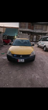 لانسر ٢٠١٠ • باسمي • كفالة