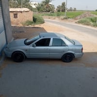 مازدا ٣٢٣ • ١٩٩٩ • نجف