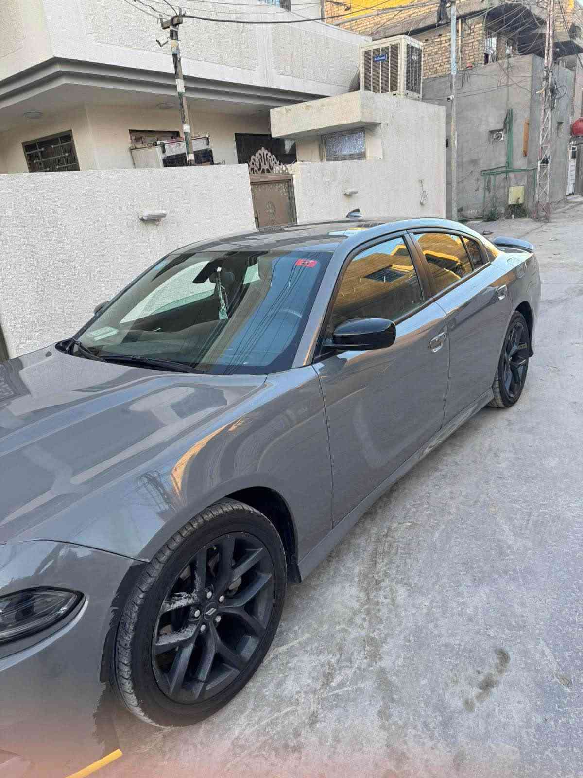 للبيع: دودج تشارجر 2023 SXT (محدثة GT) - بسعر مغرٍ!
فرصة رائعة لامتلاك سيارة دودج تشارجر 2023 بمظهر الـ GTالرياضي الجذاب، وبسعر ممتاز مراعياً للملاحظات الموجودة. السيارة بحالة جيدة جداً من الداخل والمحرك، وممشاها قليل.

التفاصيل الأساسية:
 • النوع والموديل: دودج تشارجر SXT، موديل 2023.
 • التحديث: تم تحديث الشكل الخارجي بالكامل إلى فئة GT.
 • المسافة المقطوعة (الممشى) 
 • 22 كيلومتر فقط (قابل للزيادة الطفيفة).    المعاينة.

حالة السيارة (بكل شفافية):
تم فحص السيارة في مركز المندلاوي، والتقرير مرفق للإطلاع على جميع التفاصيل. الملاحظات الرئيسية هي:
 • صبغ وفتح: الصدام الأمامي والخلفي، والجاملغ الأمامي الأيمن (مفتوح + صبغ).
 • تعديل: تعديل بسيط في بداية الشاصي الأمامي الأيمن (كما هو موضح بالتقرير).
 • ملاحظات أخرى: وجود بعض الرجعات والشخوط المتكحلة في أجزاء متفرقة، وتكمات داخلية بسيطة.
 • المحرك والكير والتبريد: ممتازة وبحالة الوكالة (شرط الفحص).
السيارة جاهزة للاستخدام اليومي، ومناسبة جداً لمن يبحث عن موديل حديث بسعر اقتصادي ويتقبل وجود الملاحظات المذكورة.

للتواصل والمعاينة:
 • رقم الهاتف: *********** (اتصال أو واتساب). بغداد, العراق

نص مكتوب في الصور:
- 6:14 plc.ua الإنجليزية العربية 4 / 10 +5 1
- LTE 6:14 plc.ua 3/10 الإنجليزية العربية +5 1
- LTE 6:14 plc.ua تم الإنجليزية العربية 2/10 +5
- 6:14 plc.ua الإنجليزية العربية 6/10 +5
- 6:14
- LTE
- plc.ua
- X
- تم
- ...
- الإنجليزية
- العربية
- G
- 1 / 10
- Q
- +
- PLC GROUP
- +5
- 1
