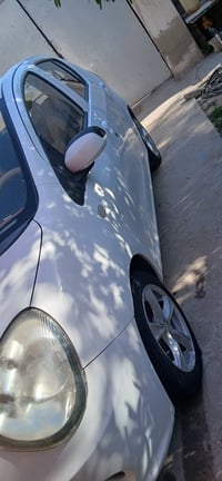 أبيض • مشي ٦٣ ألف • سنوية ساقطة