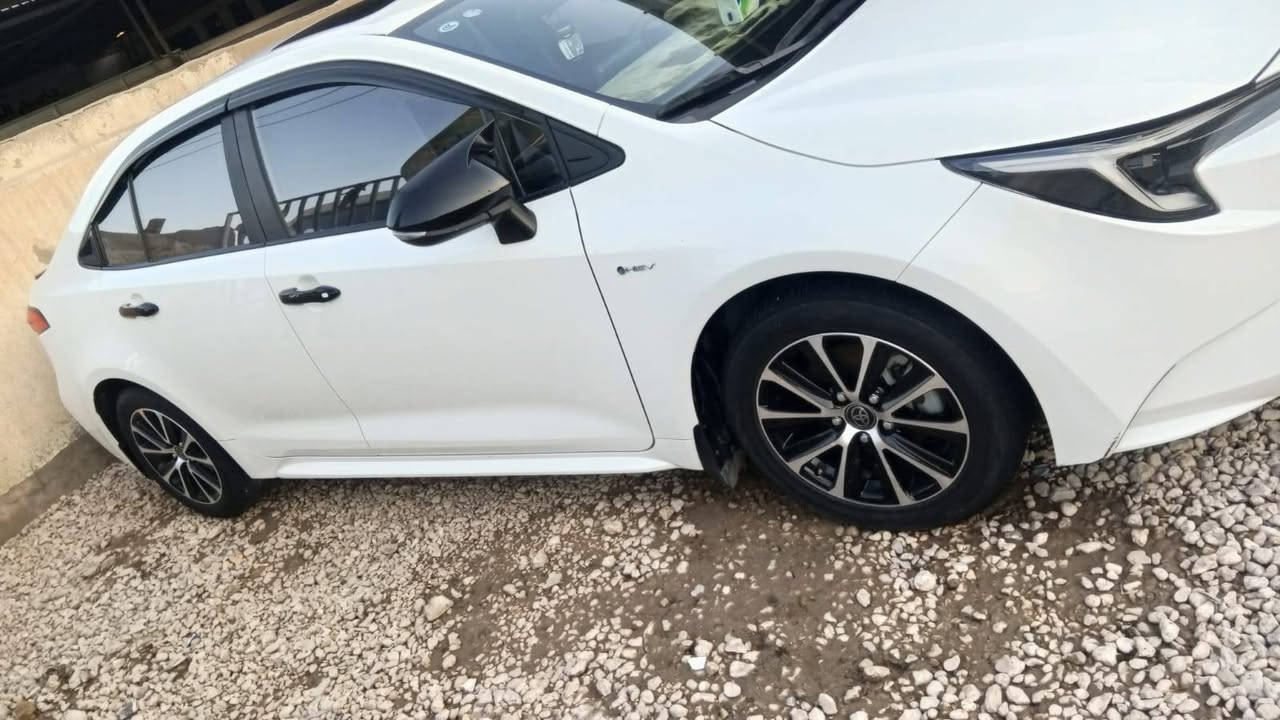 تويوتا كورولا هايبرد بغداد الدولي موديل ٢٥ ابيض خليجي شكل الأمريكي بيها بارد بالباب الخلفي جهة السائق  بسمي مكاني بابل السونار مرفق الاستفسار  ***********
