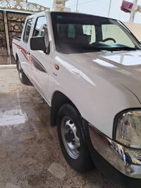 نيسان ٢٠٠٩ • صبغ باب • رقم بغداد