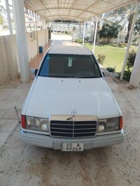 ٣٠٠ E • موديل ٩١ • رقم دولي