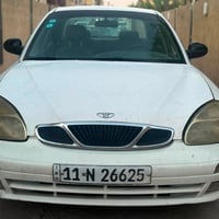 نوبرا 2002  كير محرك صدر تبريد مكفولات  تخم تاير حديد  بدون ضربه كشر ب...