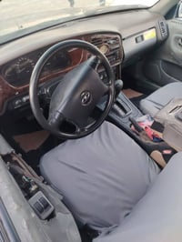 دايو برنس ٩٧ • مكينة ٢٠٠٠ • رقم بغداد