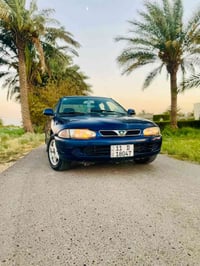 بروتون 2005 رقم بغداد باسمي مكينه 1400 كير واتماتيك سياره مكفوله من ضر...