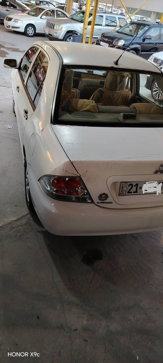 لانسەر مۆدیل 2008 مواسەفات کویتی زۆر جوانە ماڵی دۆستە 
ناو فورمیکا
ناوزەرد 
ئۆتۆماتیک 
ئاوینە کارە بای 
ئەی بیئیس 
مەکینە گەورە بیلاد 
دەسک ستیل 
ویلکەب 
تازە سیر فزی کامل کراوە 
هەمو گیانی بەشەرت 
سی بارجەی بۆیاخە بی ناو کرتن 
لە سلیمانیم کی حەزی لی بو تیڵ بکات ببور جوای نامە نادەمەوە 
ئاڵو گۆڕیش دەکەم شتیک بە دڵم بیت 
74 گەڵاو مەعامەلە 
*********** شربازهير, السليمانية

نص مكتوب في الصور:
- HONOR X9c