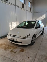 بيجو 307 السياره حلوه مال  ببت  موديل 2005  كير مكينه مكفولات رقم  بغد...