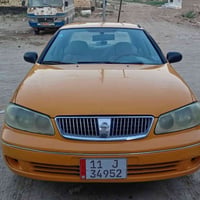 لبيع نيسان سني ياباني مديل 2009 باب وره السايق بي تصليح رقم بغداد بسمي...