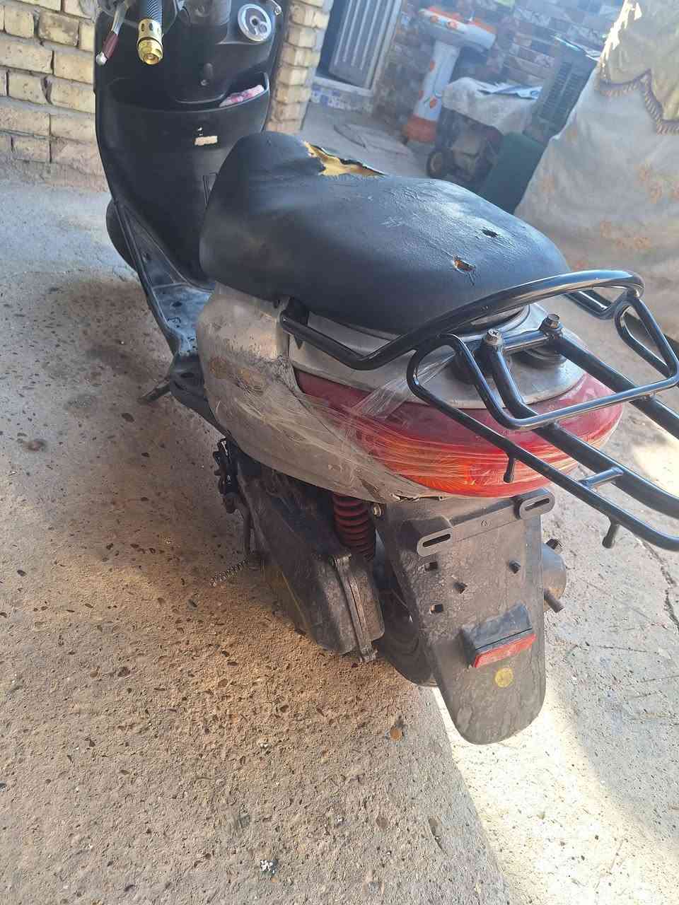 عندي دراجه بريز كايمه اريدها ٢٠٠ بغداد قرب مرور تجيات ***********

