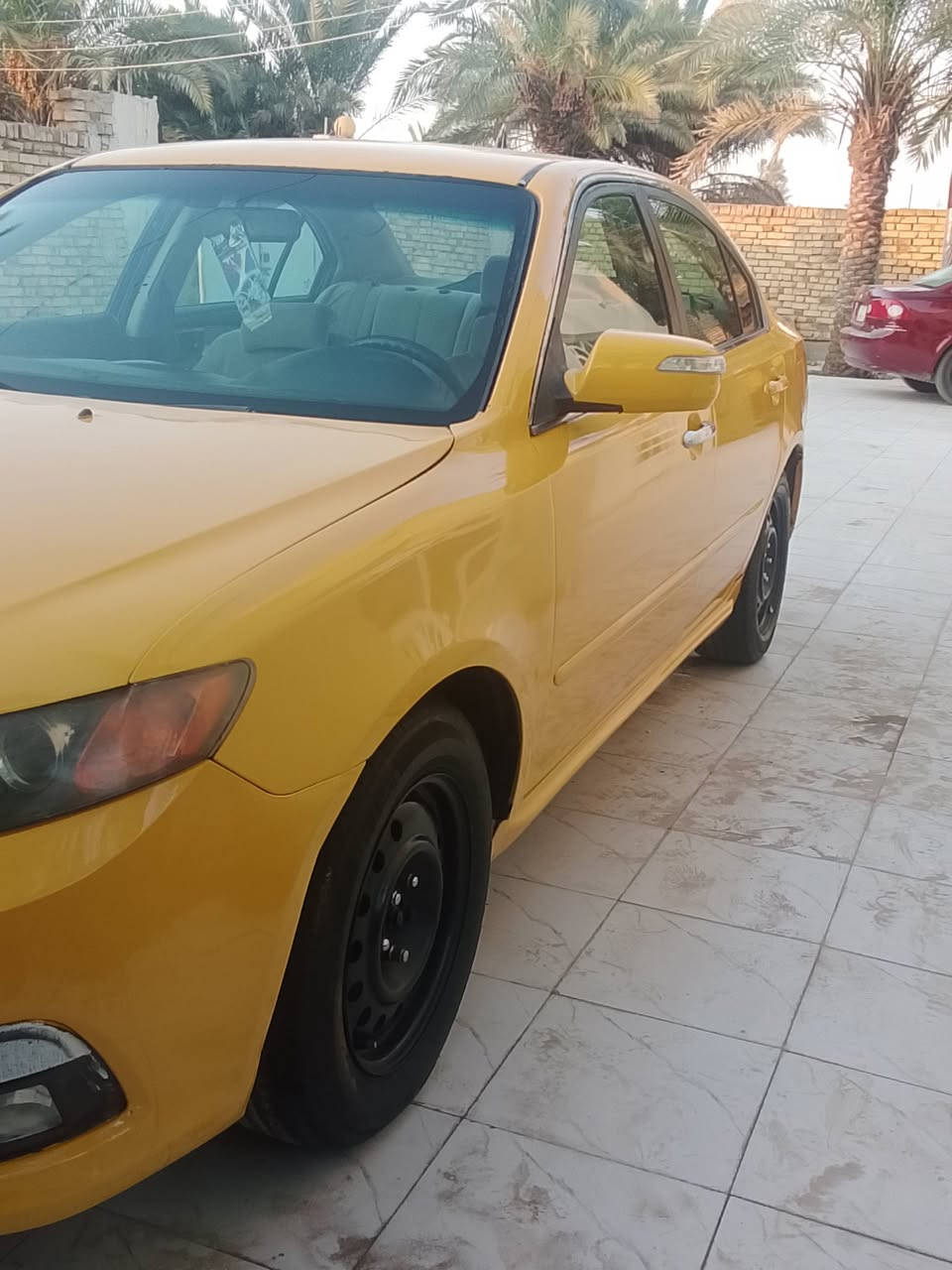 سلام عليكم سياره اوبتيمه موديل2009وارد امريكي السفسار عل رقم  ***********@
