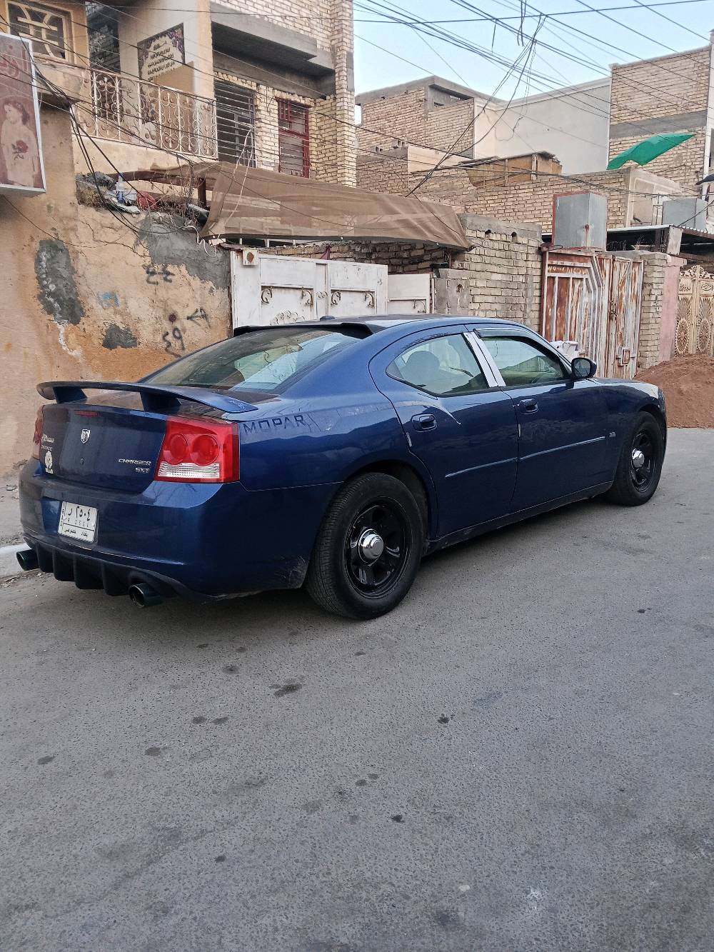جارجر موديل2010 فول فتحه تحكمات ستيرن شاشه قلاب كشن جلد كهرباء وارد كندي جاملغ امامي وخلفي رقم بغداد سعر90
