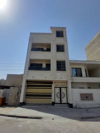 بناية تجارية • ١٠٠م • واجهة ٧م
