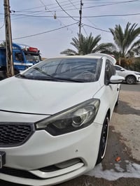 سيراتو 2014 • حساسات امامية وخلفية • شاشة وكاميرا دوارة