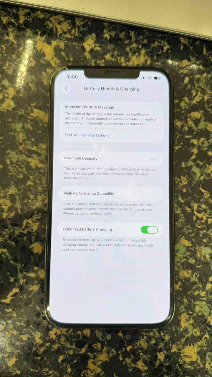 iPhone 12 pro max 
الجهاز ممفتوح ولا مصلح ولا شي 
ذاكره 256 
البطاريه 73 
بي مشكله الصوت ضعيف وفطر خفيف بالكامره الخلفيه 
كارتونه ويا كامله 
السعر قفل قفل قفل 350 
المكان كرادة داخل 
7717453741

نص مكتوب في الصور:
- 10:00 About Name iOS Version iPhone > Model Name 27.0 > Model Number iPhone 12 Pro Max Serial Number MGC73ZA/A G6TF42YP0D5M Coverage Expired Parts & Service History Songs Videos 0 Photos 1.024 Applications 8.227 Capacity 91 256 GB vailable 129,01 GB
- 10:00 Battery Health & Charging Important Battery Message The health of the battery in this iPhone has significantly degraded. An Apple Authorized Service Provider can replace the battery to restore full performance and capacity. Find Your Service Options Maximum Capacity %73 This is a measure of battery capacity relative to when it was new. Lower capacity may result in fewer hours of usage between charges. Peak Performance Capability Built-in dynamic software and hardware systems will help counter performance impacts that may be noticed as your iPhone battery chemically ages. Optimized Battery Charging To reduce battery aging, iPhone learns from your daily charging routine so it can wait to finish charging past %80 until you need to use it.
- 10:00 About Name iPhone > iOS Version 27.0 > Model Name iPhone 12 Pro Max Model Number MGC73ZA/A Serial Number G6TF42YPOD5M Coverage Expired > Parts & Service History > Songs 0 Videos 1.024 Photos 8.227 Applications 91 Capacity 256 GB Available 129,01 GB