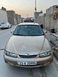 مازدا فاصولیا مۆدیل ١٩٩٧ جام کارەبا و سڵایت قفڵ مەرکەزی  گێر و مەکینە ...