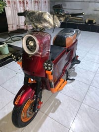 X900 CON • محرك ١٨٠٠W • مدى ٣٠-٣٥كم