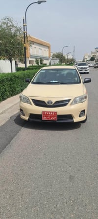 كورولا ٢٠١٤ • توماتيك • اصفر